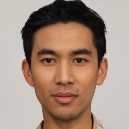 Neutral asian young-adult male with short  black hair and brown eyes