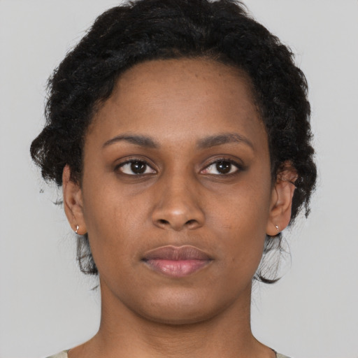 Neutral black young-adult female with short  brown hair and brown eyes