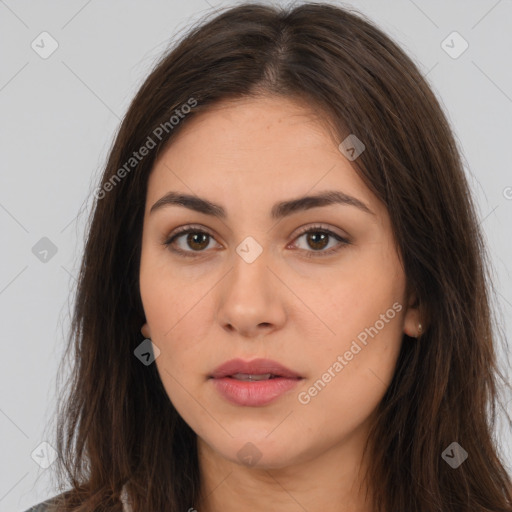 Neutral white young-adult female with long  brown hair and brown eyes