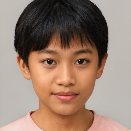 Joyful asian child female with short  brown hair and brown eyes