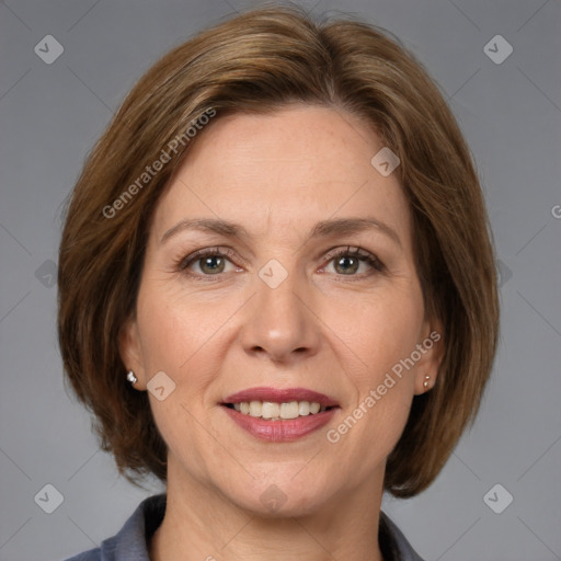 Joyful white adult female with medium  brown hair and grey eyes