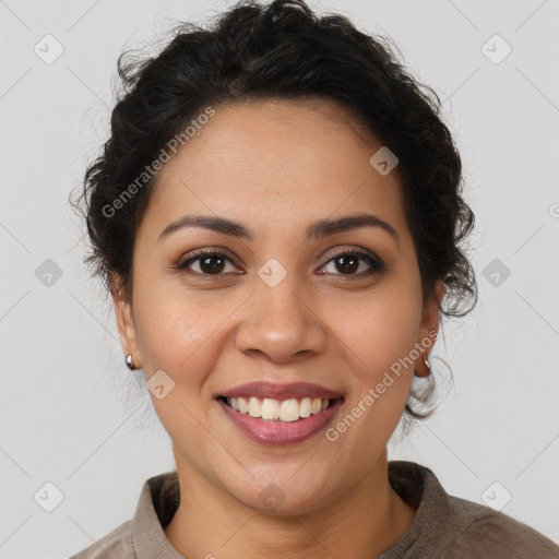 Joyful latino young-adult female with short  brown hair and brown eyes