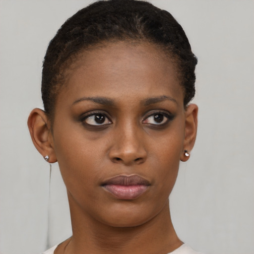 Neutral black young-adult female with short  brown hair and brown eyes