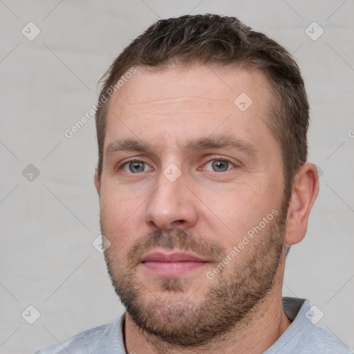 Neutral white young-adult male with short  brown hair and brown eyes