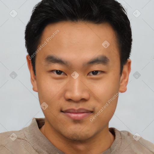 Joyful asian young-adult male with short  black hair and brown eyes