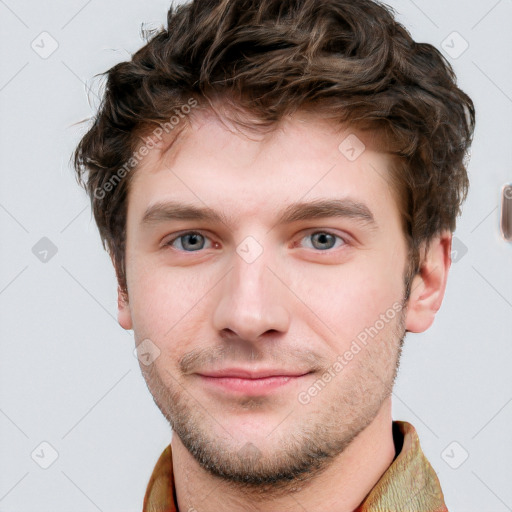 Neutral white young-adult male with short  brown hair and grey eyes