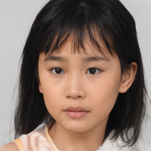 Neutral asian child female with medium  brown hair and brown eyes