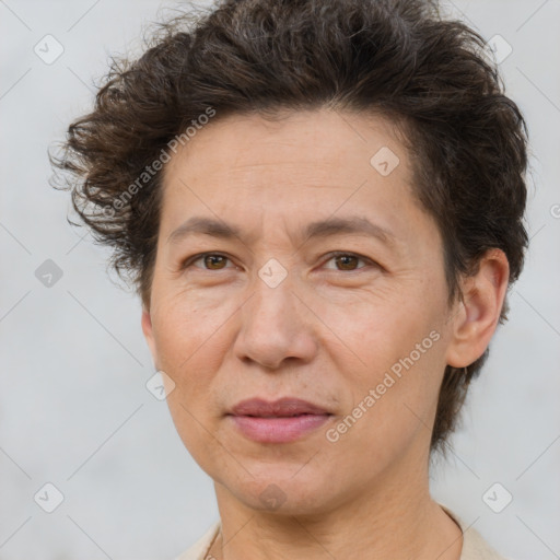 Joyful white adult female with short  brown hair and brown eyes