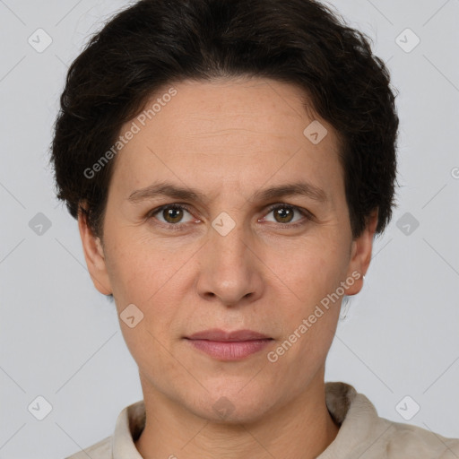 Joyful white adult female with short  brown hair and brown eyes