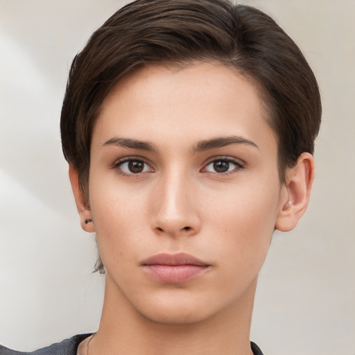 Neutral white young-adult female with short  brown hair and brown eyes