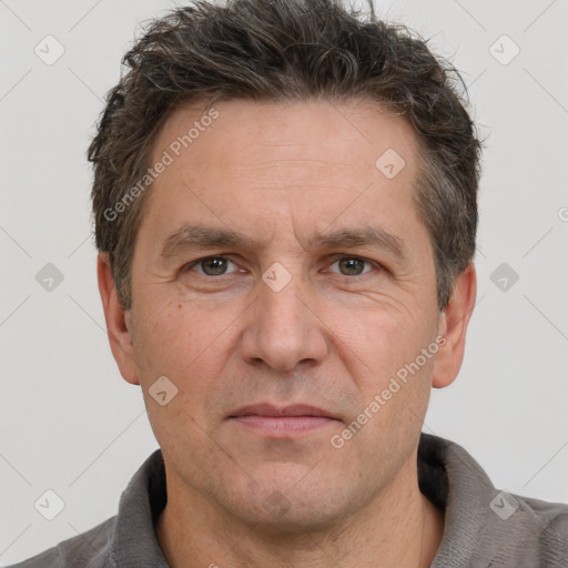 Neutral white adult male with short  brown hair and brown eyes