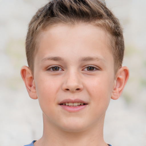 Joyful white child male with short  brown hair and brown eyes