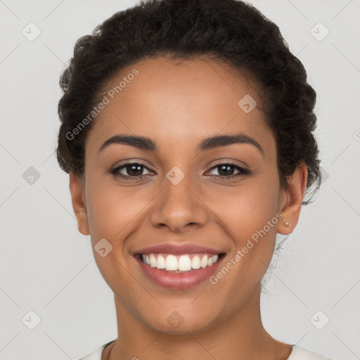 Joyful latino young-adult female with short  brown hair and brown eyes