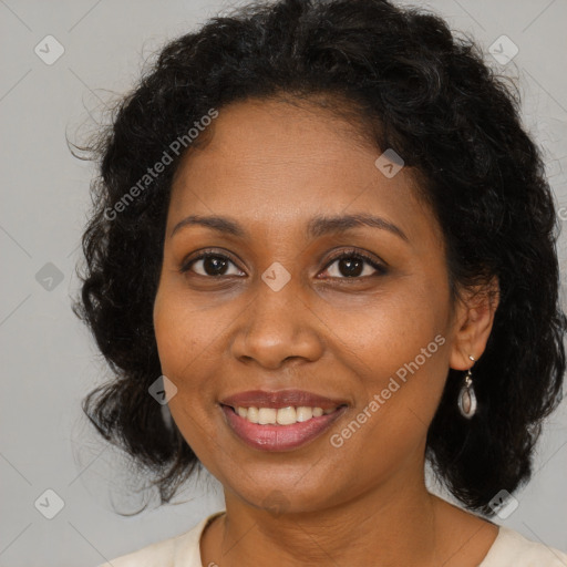 Joyful black young-adult female with medium  brown hair and brown eyes