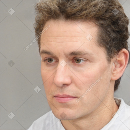 Neutral white adult male with short  brown hair and brown eyes