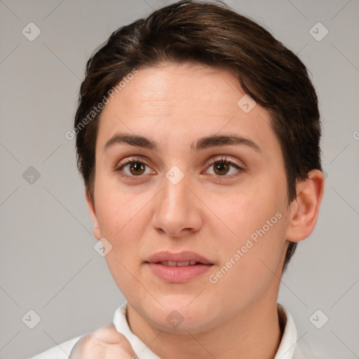 Joyful white young-adult female with short  brown hair and brown eyes