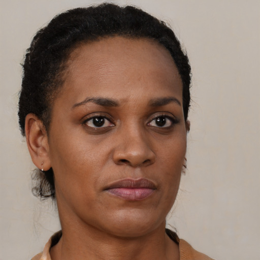 Neutral black young-adult female with short  brown hair and brown eyes