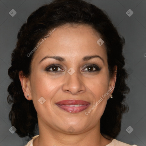 Joyful black adult female with medium  brown hair and brown eyes