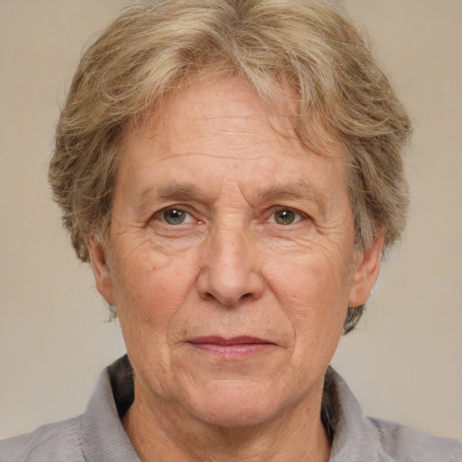 Joyful white middle-aged male with short  brown hair and brown eyes