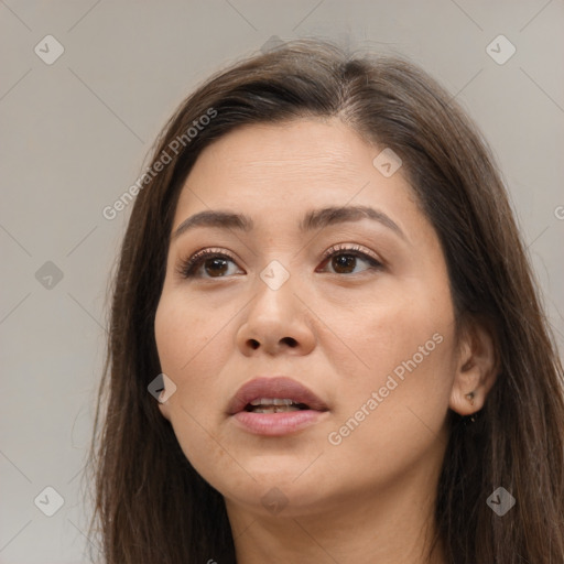 Neutral white young-adult female with long  brown hair and brown eyes