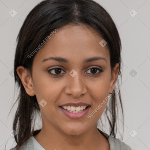 Joyful latino young-adult female with medium  brown hair and brown eyes