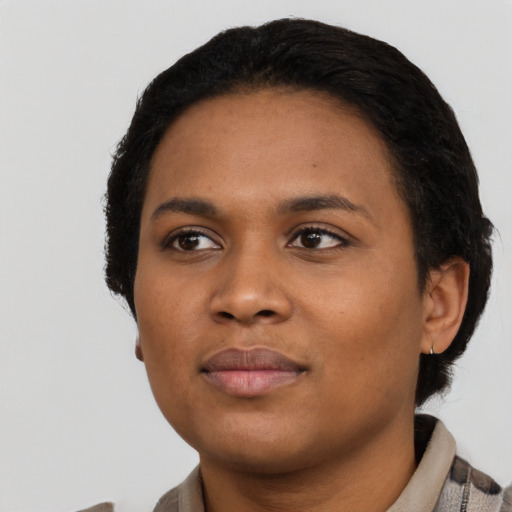 Neutral black young-adult female with short  black hair and brown eyes