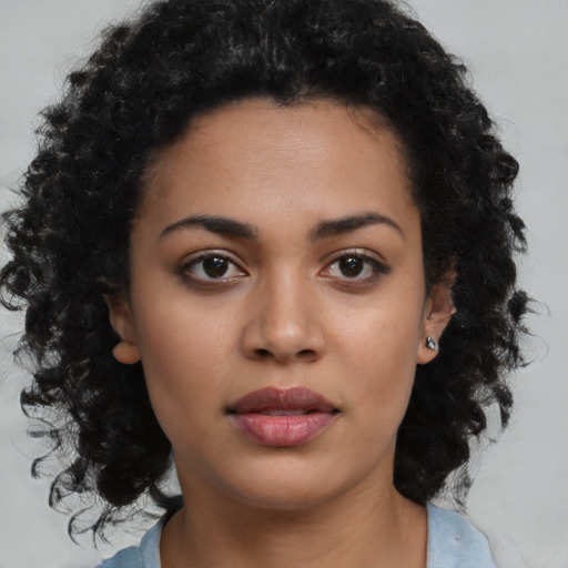 Neutral latino young-adult female with medium  black hair and brown eyes