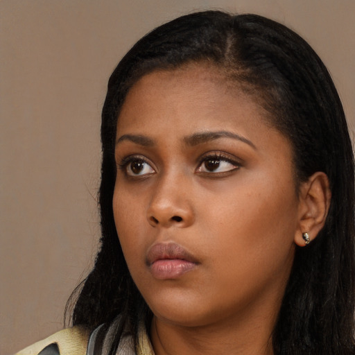 Neutral black young-adult female with long  black hair and brown eyes