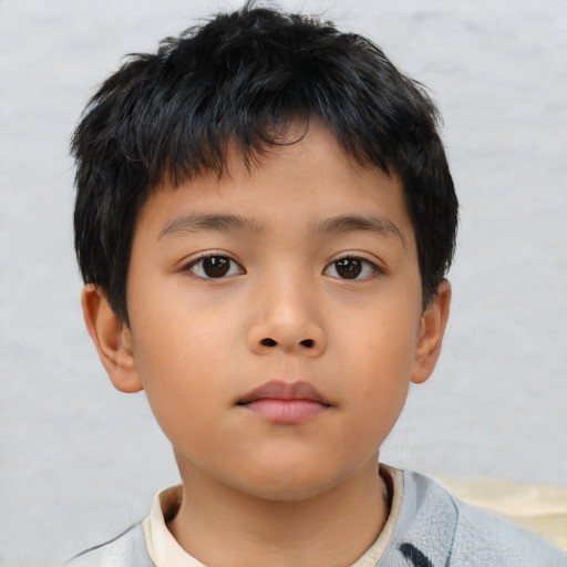 Neutral asian child male with short  brown hair and brown eyes