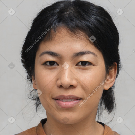 Joyful asian young-adult female with medium  black hair and brown eyes