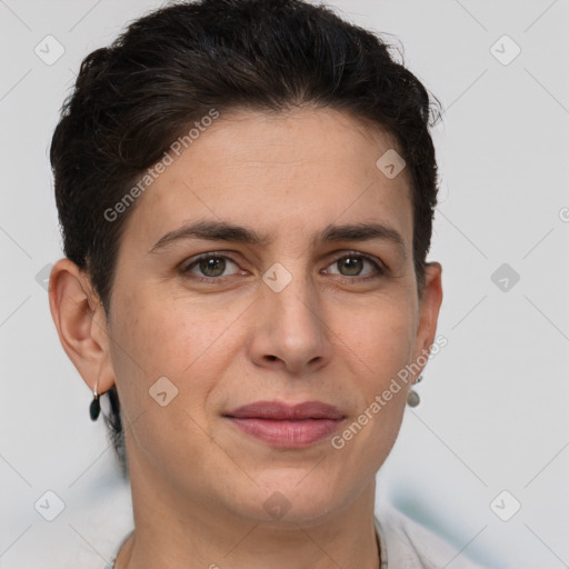 Joyful white adult female with short  brown hair and brown eyes