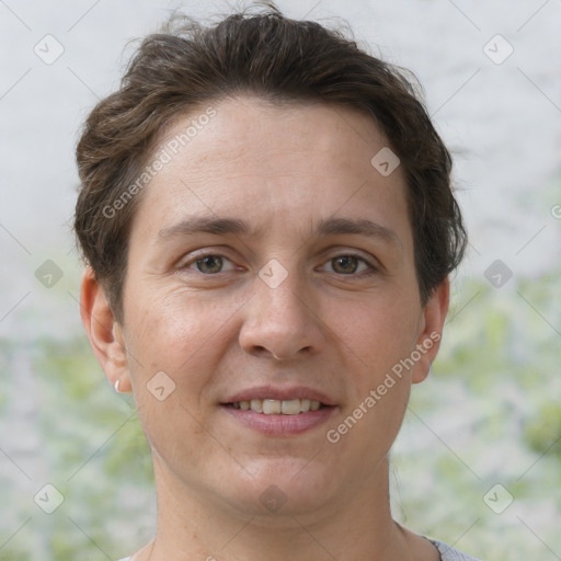 Joyful white adult female with short  brown hair and brown eyes