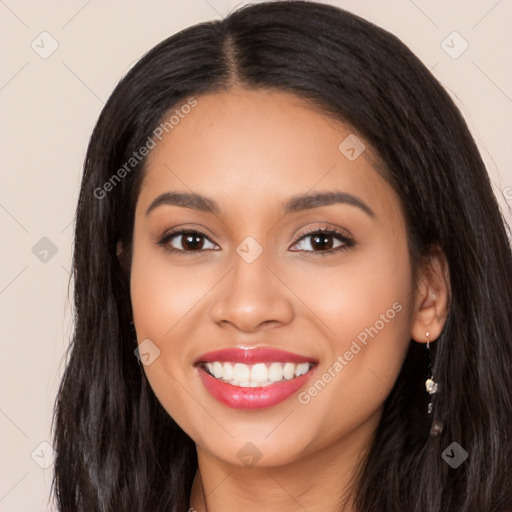 Joyful latino young-adult female with long  black hair and brown eyes