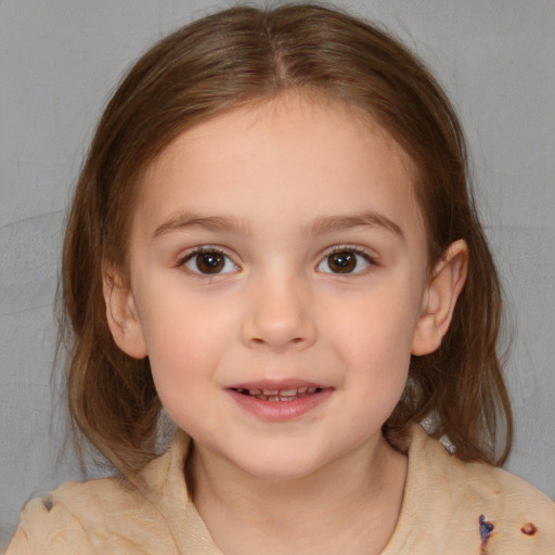 Joyful white child female with medium  brown hair and brown eyes