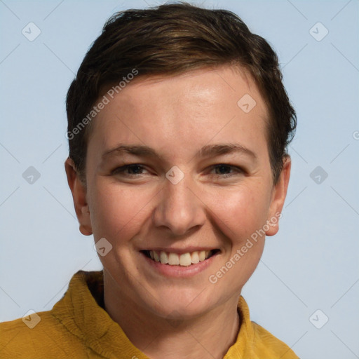 Joyful white young-adult female with short  brown hair and grey eyes