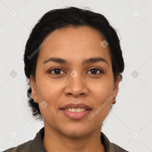 Joyful latino young-adult female with medium  brown hair and brown eyes