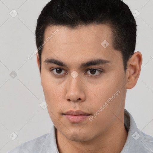 Neutral latino young-adult male with short  black hair and brown eyes