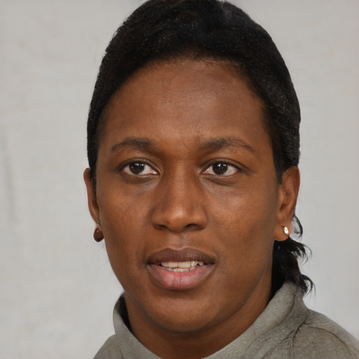 Neutral black young-adult female with short  black hair and brown eyes