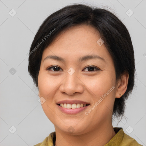 Joyful asian young-adult female with short  brown hair and brown eyes