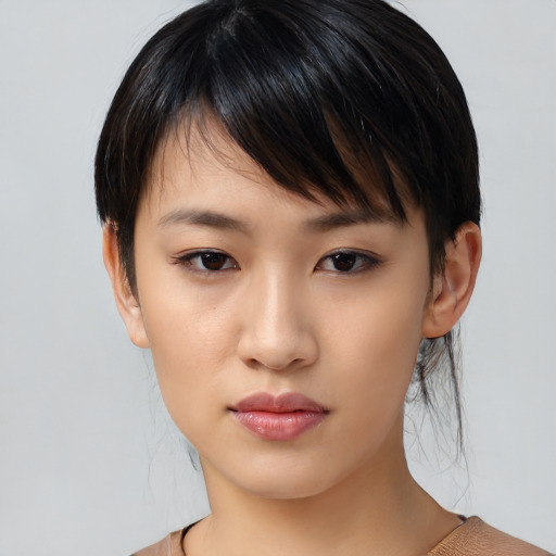 Neutral asian young-adult female with medium  brown hair and brown eyes