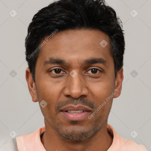 Joyful latino adult male with short  black hair and brown eyes