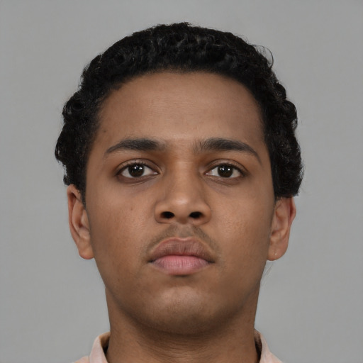 Neutral black young-adult male with short  brown hair and brown eyes