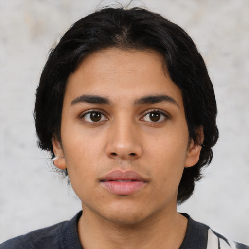 Neutral latino young-adult female with medium  black hair and brown eyes