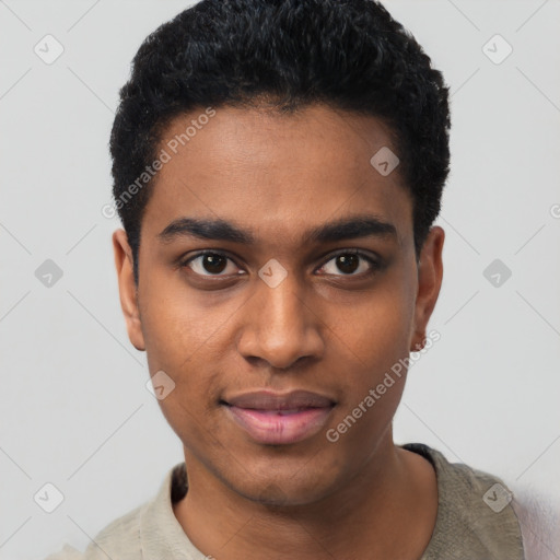 Joyful black young-adult male with short  black hair and brown eyes