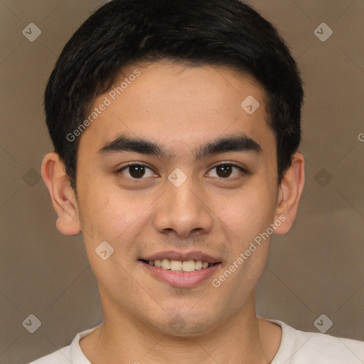 Joyful latino young-adult male with short  brown hair and brown eyes