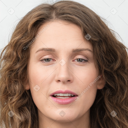 Joyful white young-adult female with long  brown hair and green eyes