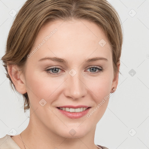 Joyful white young-adult female with medium  brown hair and blue eyes