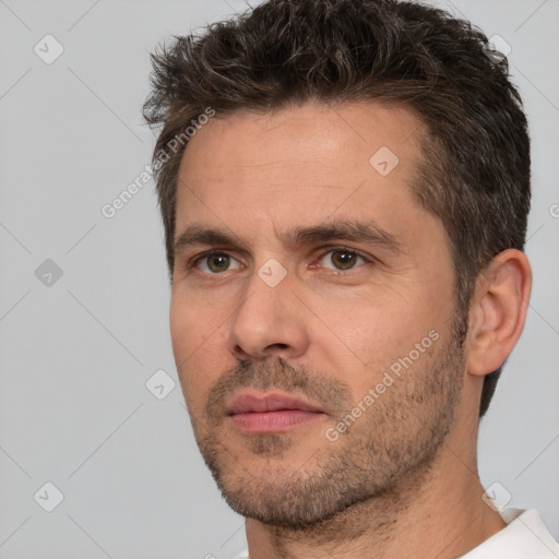 Neutral white adult male with short  brown hair and brown eyes