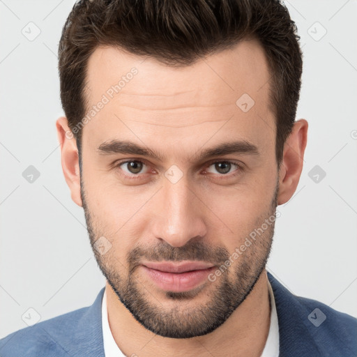 Joyful white young-adult male with short  brown hair and brown eyes