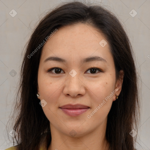 Joyful asian young-adult female with medium  brown hair and brown eyes